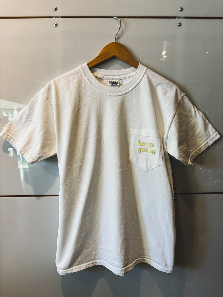 Keep Going white pocket s/s tee with gold lettering - upcycled
