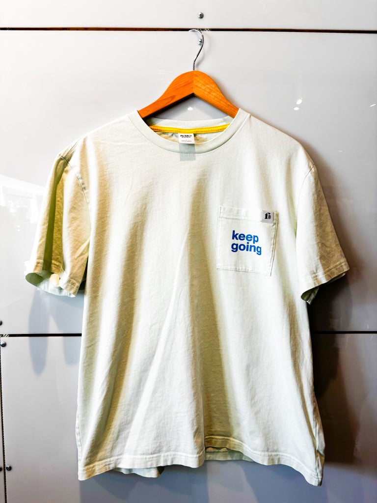 Keep Going melon green pocket s/s tee - upcycled