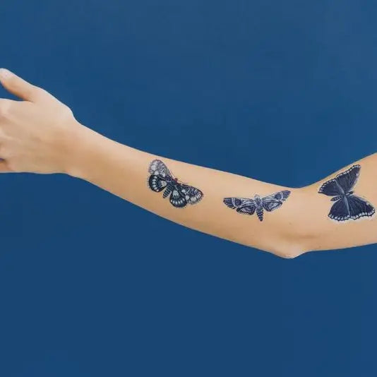 Sapphire Moths Tattoo